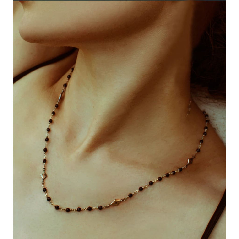 Black onyx and diamond necklace, dual harmony Necklace,  A fashionable necklace that graces a stationed of micro onyx beads and alternates with an open and closed diamond shape motifs
