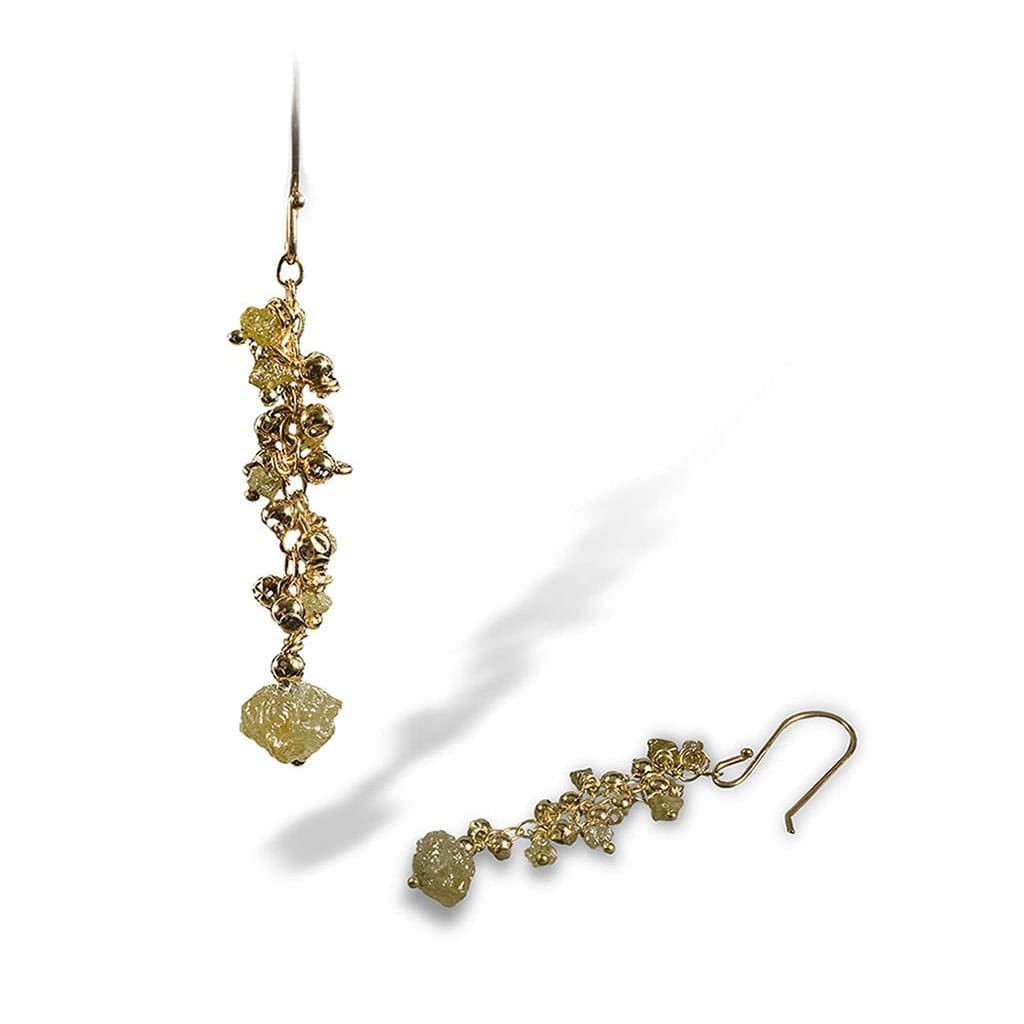A cluster of enriched 18K yellow fine gold beads and tiny rough diamond earrings