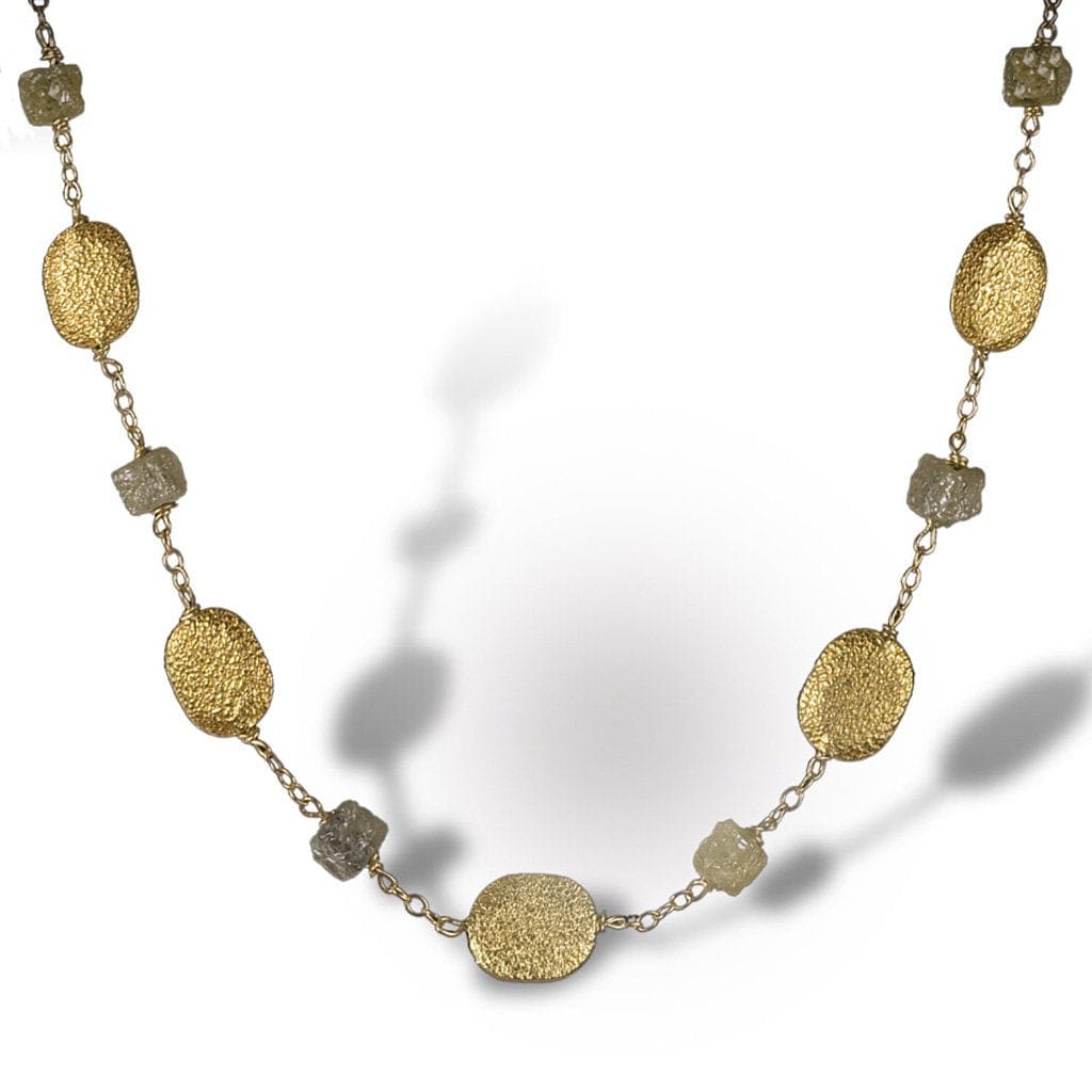 Textured necklace of enriched 18K yellow fine gold coin-like pieces with rough diamonds