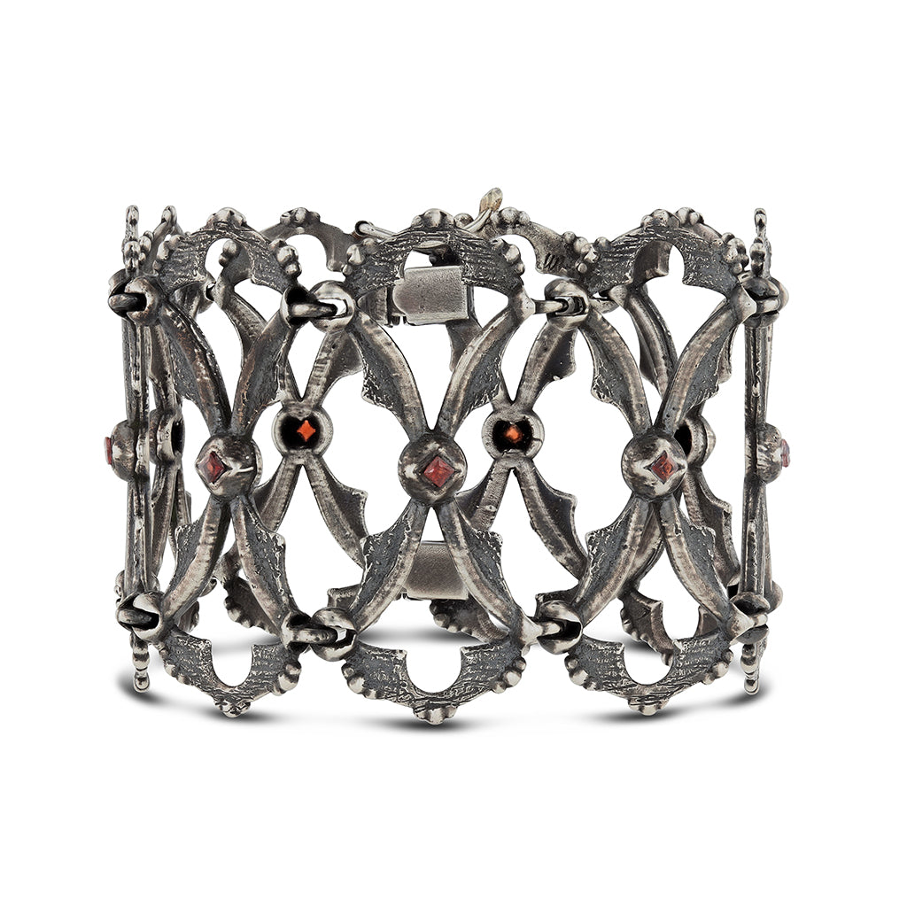 Michelle Valadon gold charm bracelet with gemstone accents
