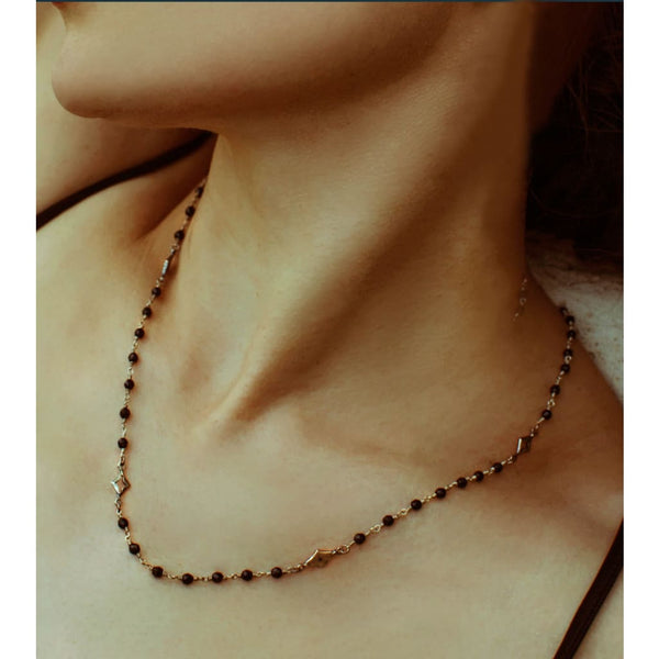 Black onyx and diamond necklace, dual harmony Necklace,  A fashionable necklace that graces a stationed of micro onyx beads and alternates with an open and closed diamond shape motifs