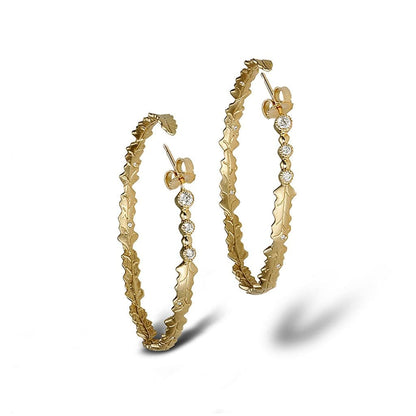 Fashionable Hoops in a circular wreath of satin finish leaves and diamonds