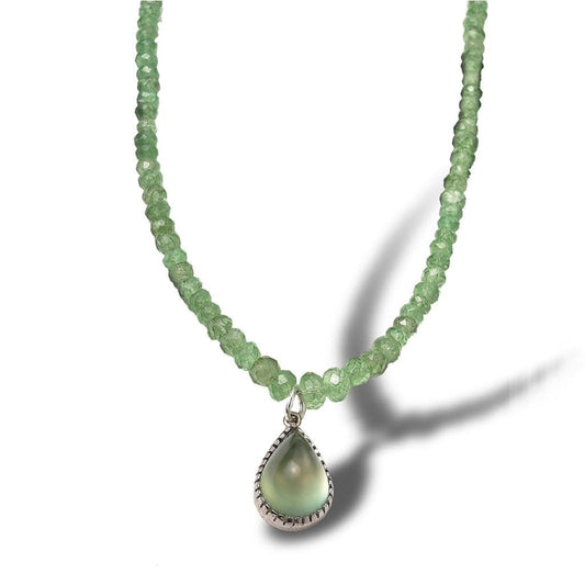Fine green semi-precious stones with a finishing touch of a green translucent pear-shaped dangle stone pendant