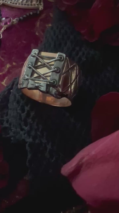 “Corset Ring” 14K rose gold with blackened oxidation