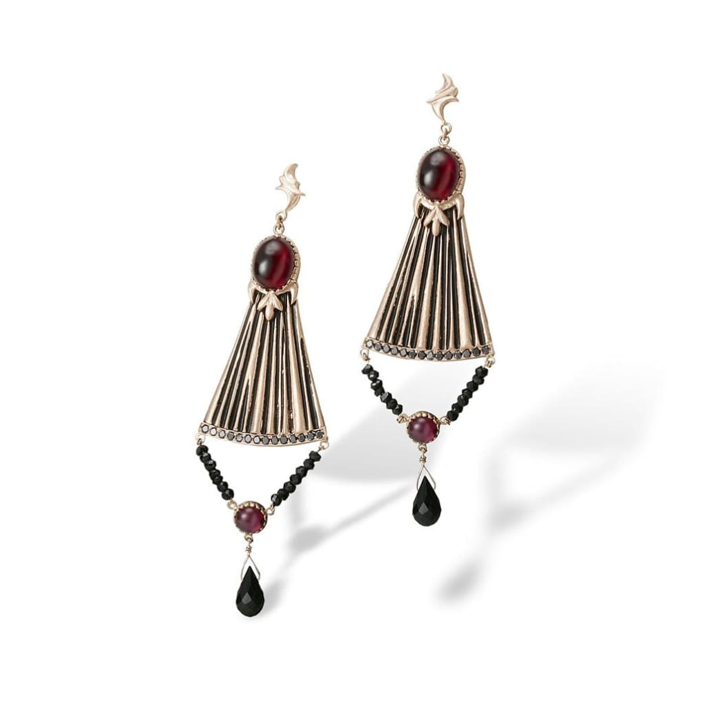 A feminine stylized chandelier earring in rose gold with a flirty and fashionable style
