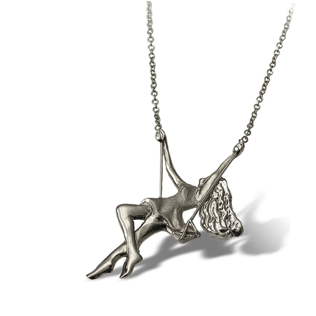 White gold pendant necklace: A free spirited pinup golden girl pendant necklace swings playfully along