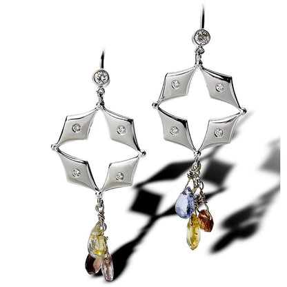 A diamond star cut out earring with dangle fanciful colored stone sapphires